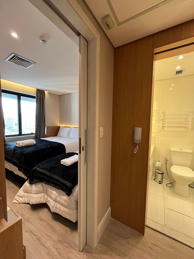 Flat Hotel Slaviero GRU 2 Quartos até 6p | Delfhy